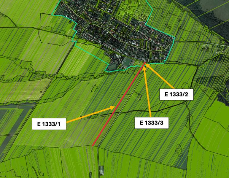 View of agricultural and forest land near Štrba with marked parcels.