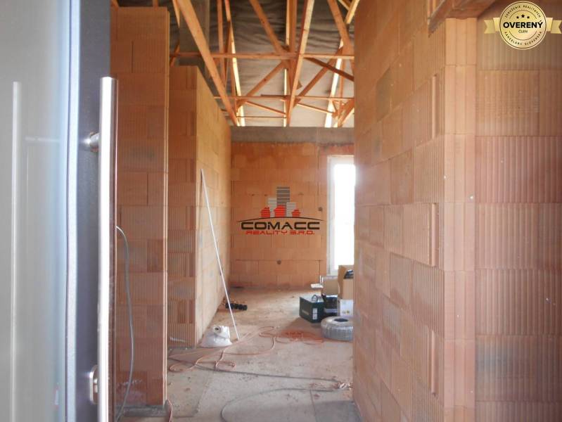 In the unfinished family house on Nové Mesto nad Váhom street, there are brick walls.