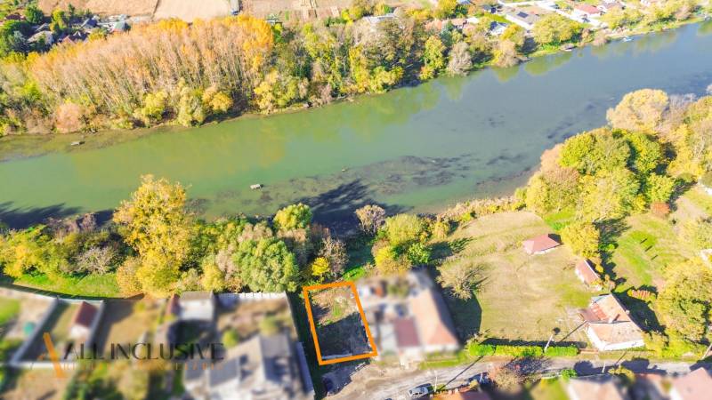 A residential plot in Jahodná, close to the river and surrounded by greenery.