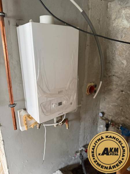 Boiler room of a family house in Stará Kremnička with a wall-mounted gas boiler.