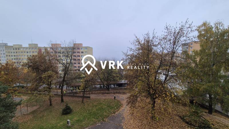 A housing estate with panel buildings and an autumn scene on Ovručská Street in Košice, Dargovských Hrdinov district.
