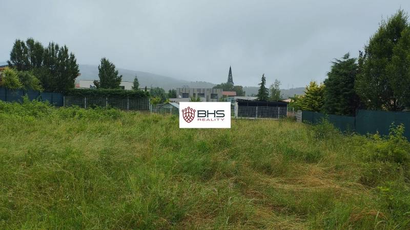 A plot of land in Limbach suitable for living, bordered by a fence, with a view of nature.