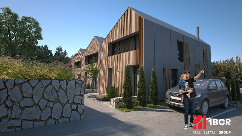 Family houses in Turecká with wooden decor, stone fence, and a parked car.