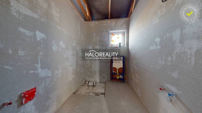 Bare walls of a bathroom under construction in a family house.