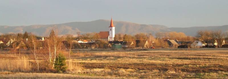 Panorama of the village Studienka on Pod Borovicou Street with a church, an ideal location for living.