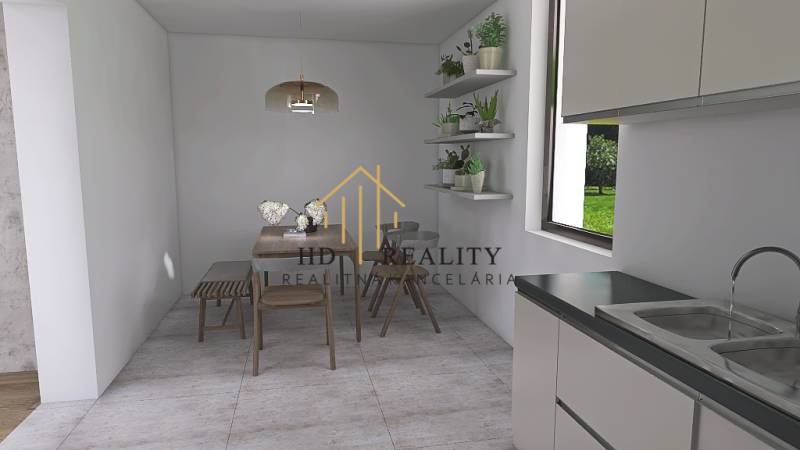 Dining room in a family house with decorative shelves, a window, and a dining table.