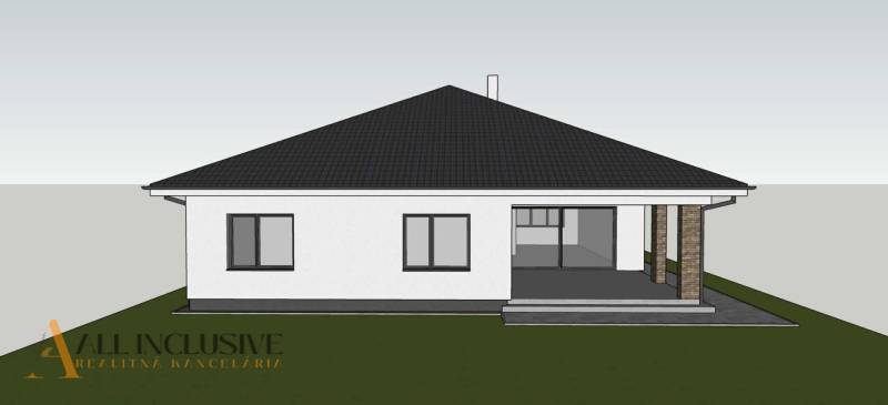 A family house in Bajč with a white facade and a structured roof.