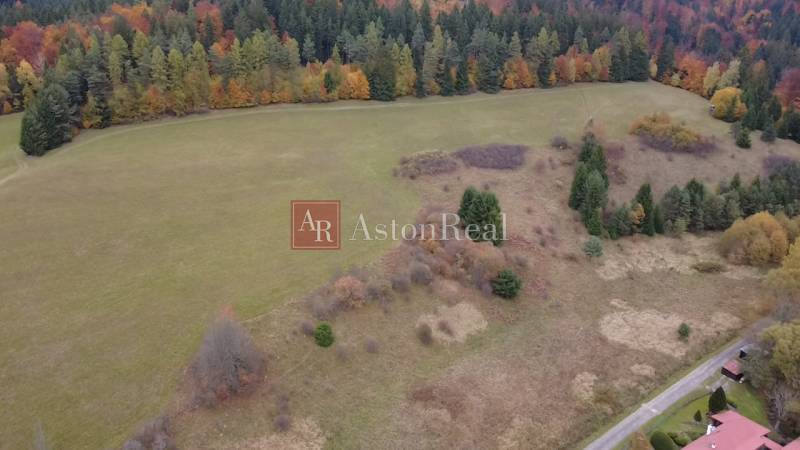 A meadow surrounded by forests in the Recreational Grounds, Lazy pod Makytou, Čertov with an autumn scenery.