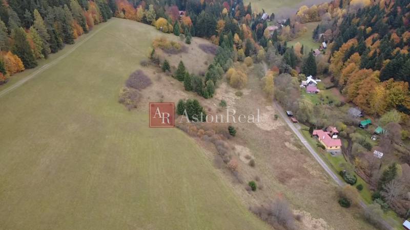 Aerial view of recreational plots in Čertov, Lazy pod Makytou, surrounded by nature and forests.