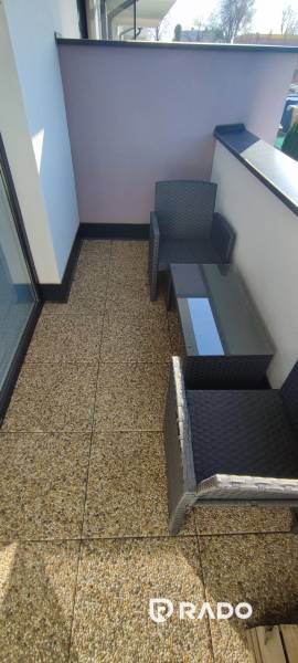 Balcony with seating in a 2-room apartment on Predmerského Street in Trenčín.