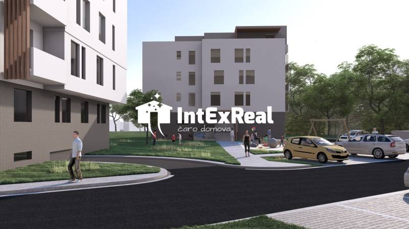 Building in Galanta, surroundings with people, cars, and a playground, offering a 2-room apartment.