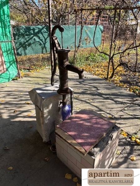 Water pump in the gardens on Stredná Street in Bratislava - Ružinov during autumn.
