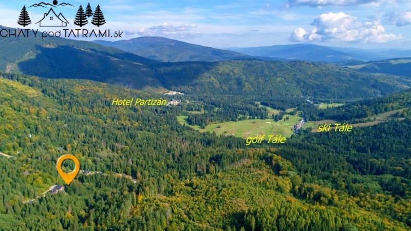 Aerial view of the forest around the Cottage in the village of Bystrá on Tále Street.