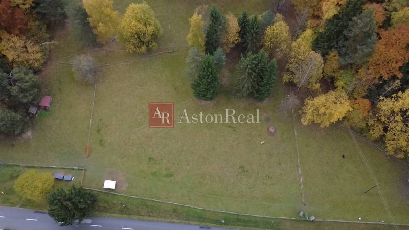 Aerial view of Recreational plots in Čertov, Lazy pod Makytou, surrounded by trees.
