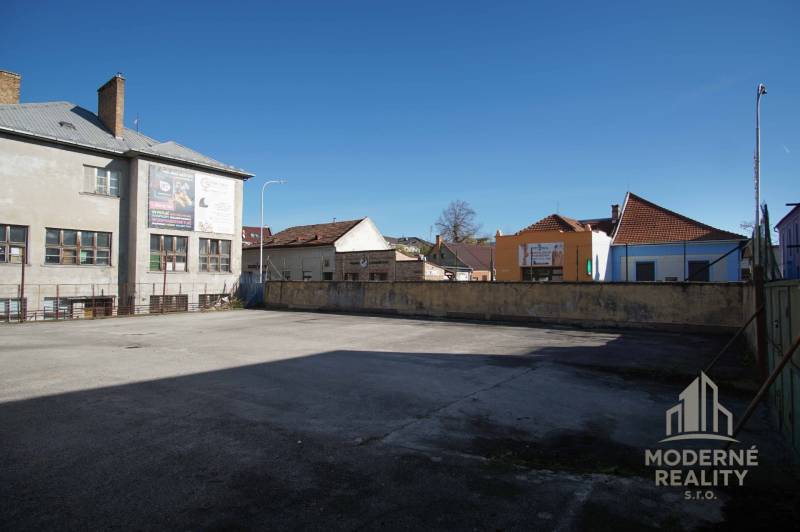 Spacious plot for living in the center of Nové Zámky with surrounding historical buildings.