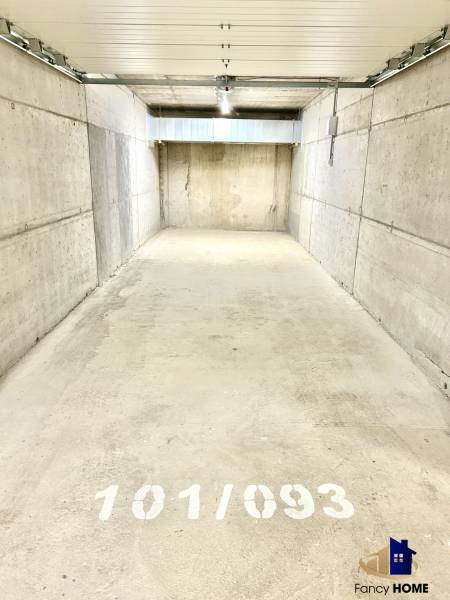 Concrete garage on Karpatská Street in Poprad with the number 101/093.