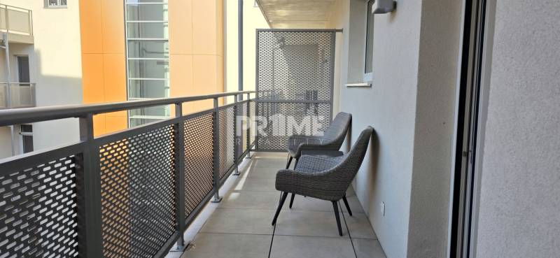 Balcony of a 2-room apartment, Bratislava - Staré Mesto, Bezručova, with seating and metal railing.
