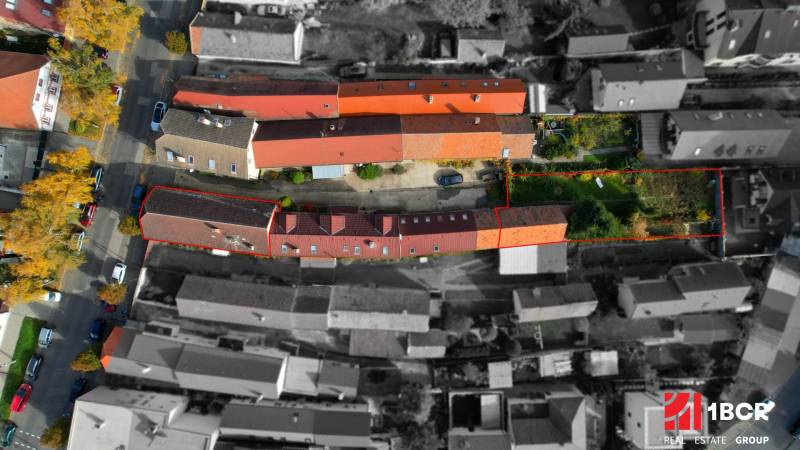 A view from above of family houses and gardens on Alstrova Street in Bratislava - Rača.