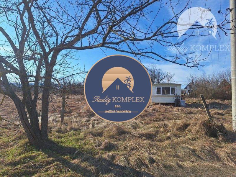 Natural lands with a caravan in Radvaň nad Dunajom, Agricultural and forest lands.