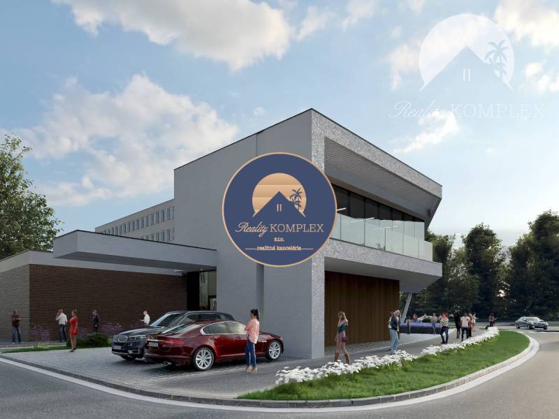 A modern building with glass railings, cars, and people on a residential property.