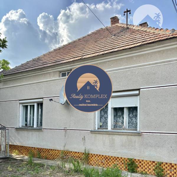 A family house in Bátorove Kosihy with a classic facade and a sloped roof.