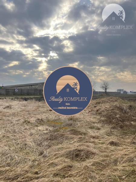 Land condition in Zlatná na Ostrove, in front of the family house, with a cloudy sky.