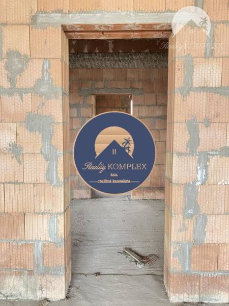 Brick construction inside a family house, undergoing renovation.