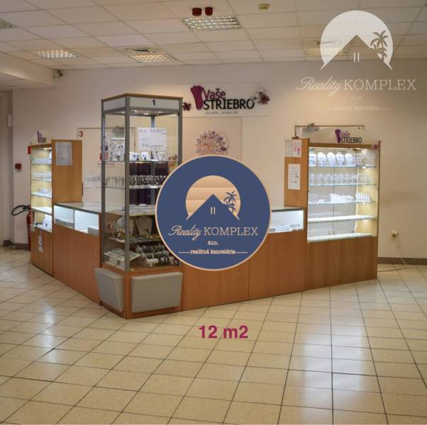 The commercial spaces offer jewelry, display cases line the space with lights.