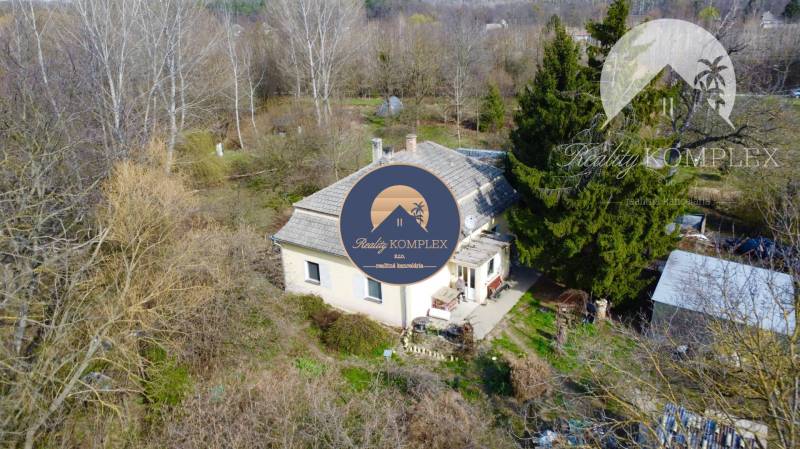 A house surrounded by trees, plots - living in Dedina Mládeže, peaceful nature.