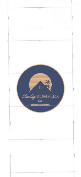 Plot of residential land in Kostolné Kračany with the Reality Komplex logo.
