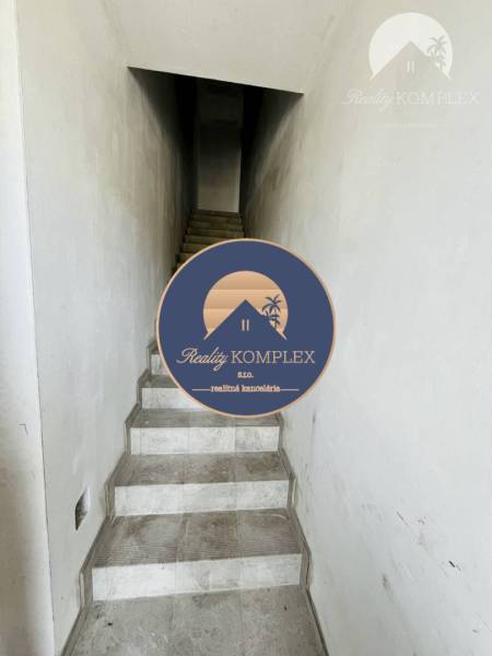 A narrow staircase with a tiled floor leads to the upper floor of a 3-room apartment.