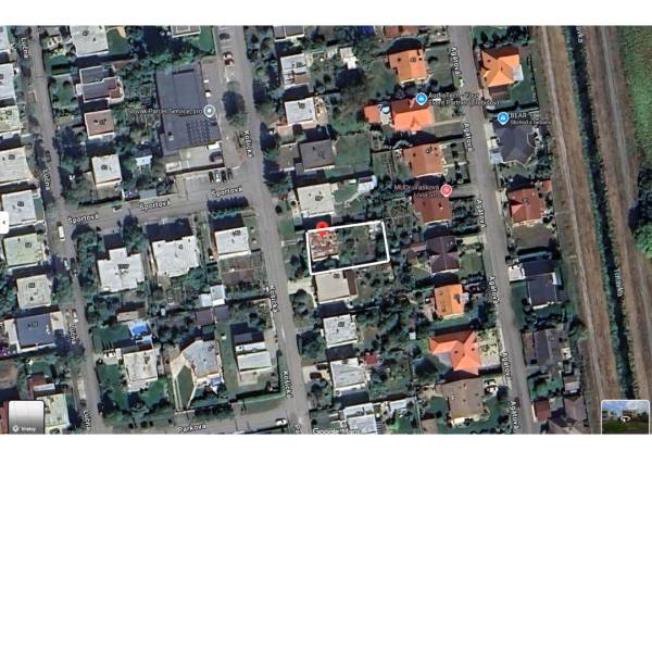 Aerial view of a family house on Košická Street in Trebišov with surrounding gardens.