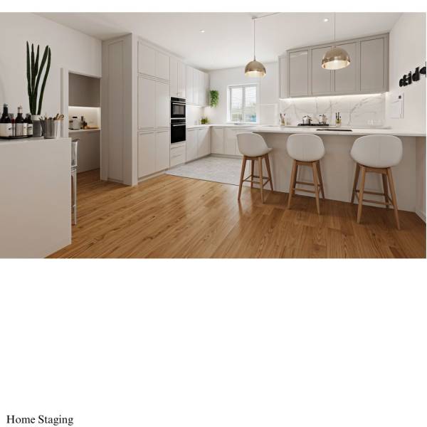 A kitchen in a family house with white cabinets and a wood-patterned floor.