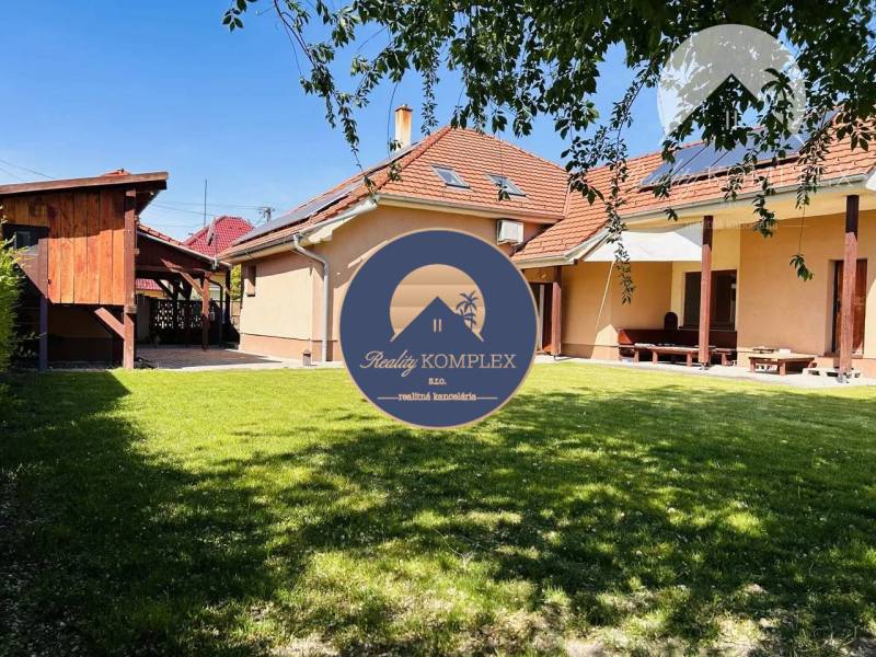 A family house in Komárno with a landscaped garden and terrace.