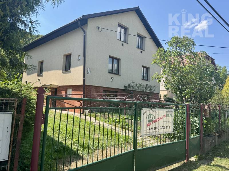 Family house for sale on Dúbravská Street 58 in Prešov, surrounded by greenery.