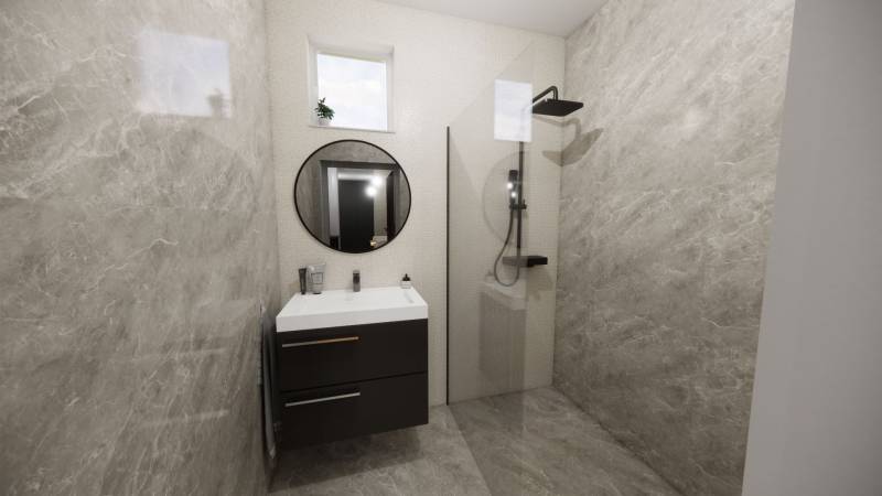 A bathroom in a family house with a modern shower and a round mirror.