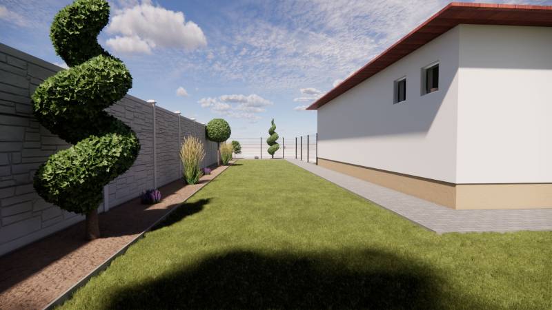 A family house in Zemianska Olča with a neatly maintained garden and decorative spiral greenery.