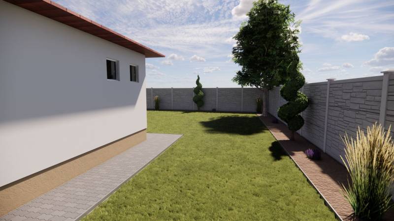 A view of the courtyard of a family house in Zemianska Olča with landscaped greenery and a walkway.