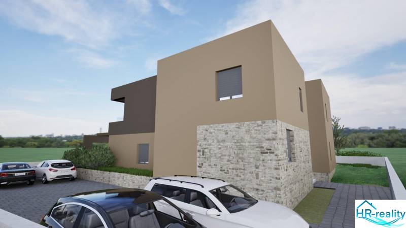 A recreational apartment in Vodice with a terrace and parking, surrounded by greenery.