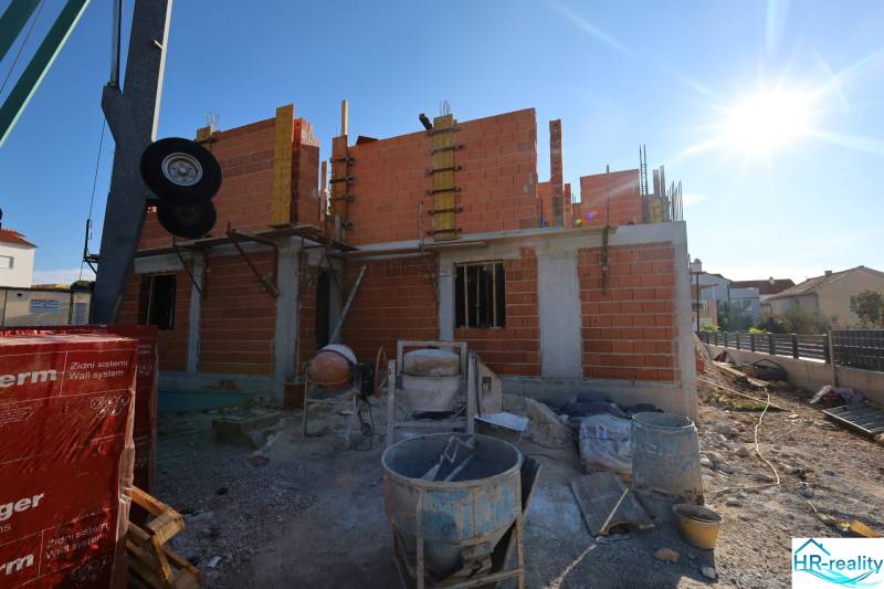 Construction of a recreational apartment in the town of Vodice, material used: bricks.