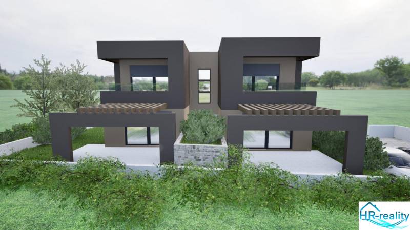 A recreational apartment in the city of Vodice with modern architecture and a landscaped garden.