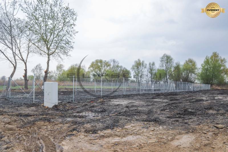A residential plot on Nad potokom street in Zohor, bordered by a fence with an electrical box.