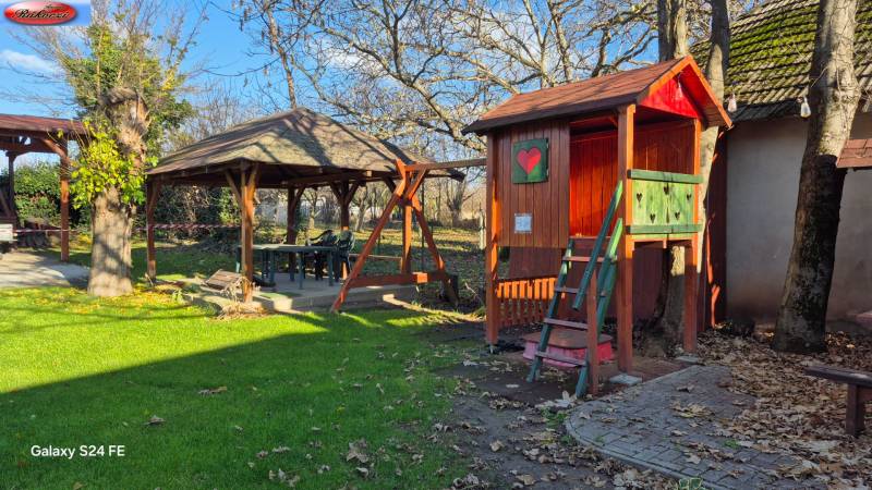 Wooden house and garden gazebos in the commercial premises on Park Street and Main Road, Veľké Ludince.