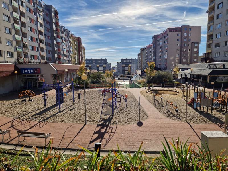 Playground on Pribišova Street in Bratislava - Dlhé diely with surrounding apartment buildings.