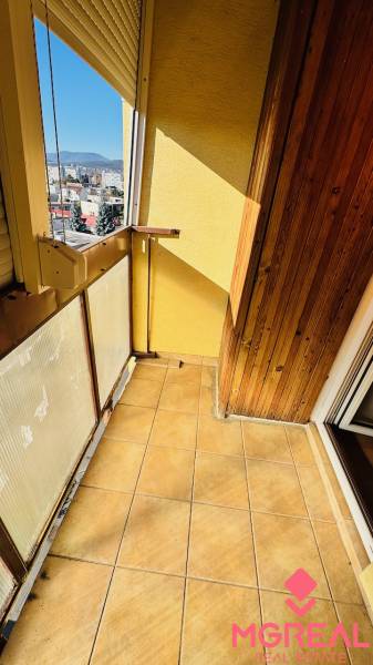 Cozy balcony from a 4-room apartment with a view of Prievidza from I. Krasko Street.