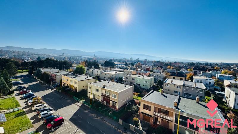 View of houses and streets in Prievidza on I. Krasko from a 4-room apartment.