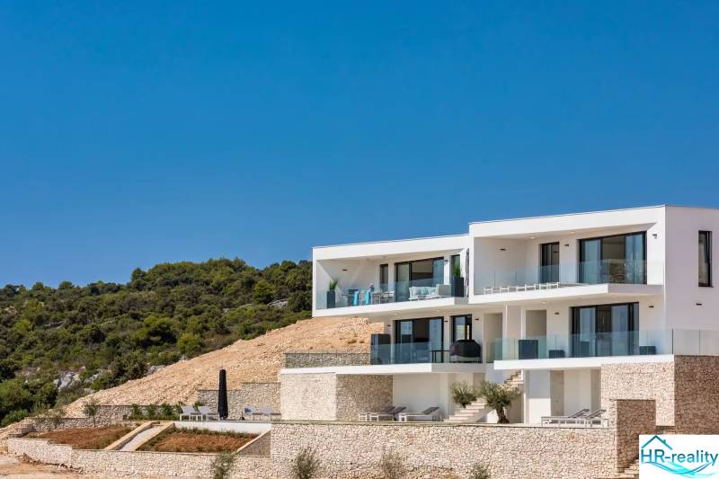 A recreational apartment in Rogoznica with a countryside view, terrace, and stone details.