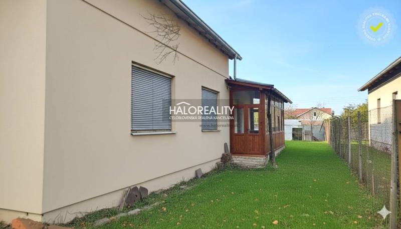 A family house in Rimavská Sobota with a glazed terrace and a well-maintained garden.