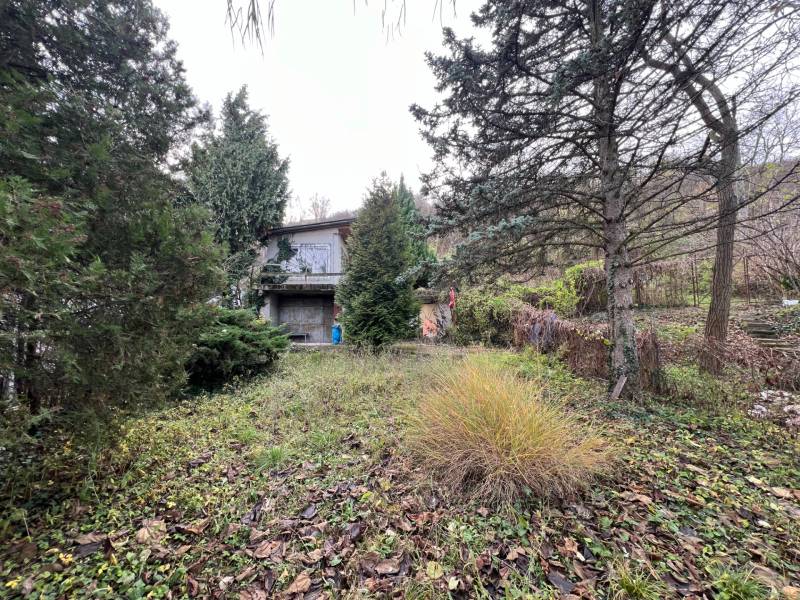 A cottage in Bratislava - Devínska Nová Ves, Pod Srdcom, surrounded by greenery and trees.