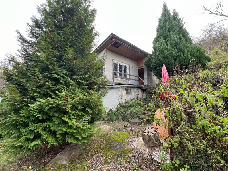 A cottage on Pod Srdcom Street in Bratislava - Devínska Nová Ves, surrounded by greenery.